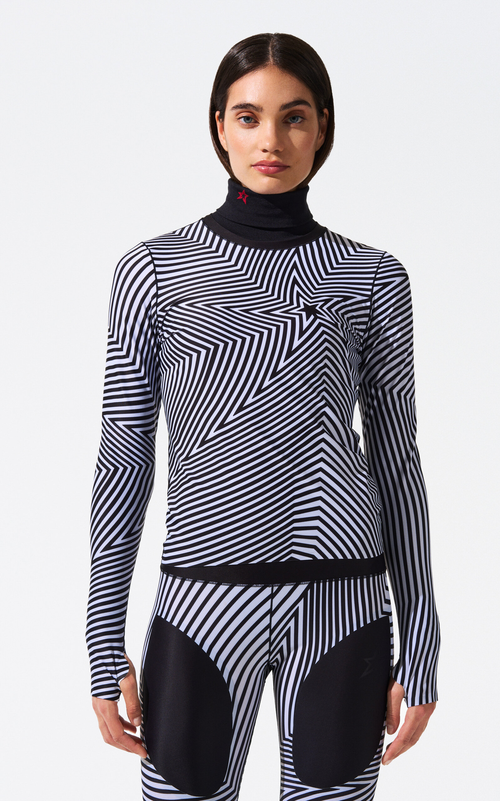 Perfect Moment Wavy Star Merino Wool Turtleneck Sweater In Black,white