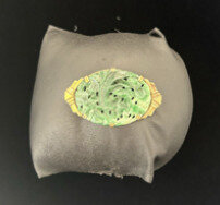 Blu Dog World Brooch; C. 1940; 10k Yellow Gold With 19th Century Jadeite Oval Floral Carved Plaque