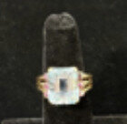 Blu Dog World Ring; Retro; C. 1940; 14k Rose-gold; Emerald-cut Aquamarine; With Small Side Rubies