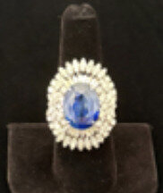 Blu Dog World Ring; C. 1975; 10.28 Carat Oval Blue Sapphire; With 2.87 Carats Diamonds In 18k White Gold With Cert