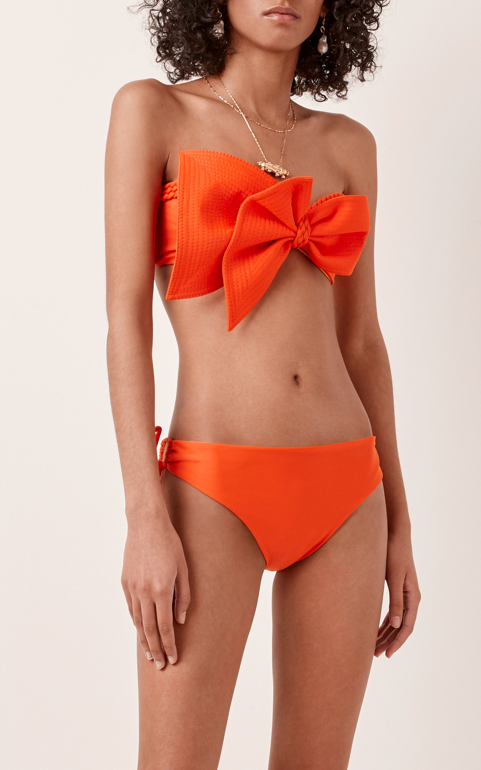 Johanna Ortiz orange bow bikini.
