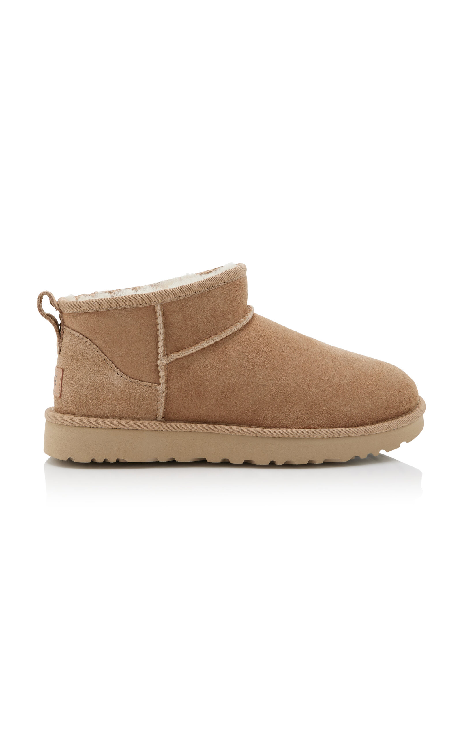 Shop Ugg Classic Ultra Mini Sheepskin Ankle Boots In Neutral