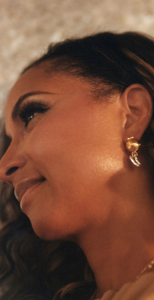Shirley Madere side profile with earrings