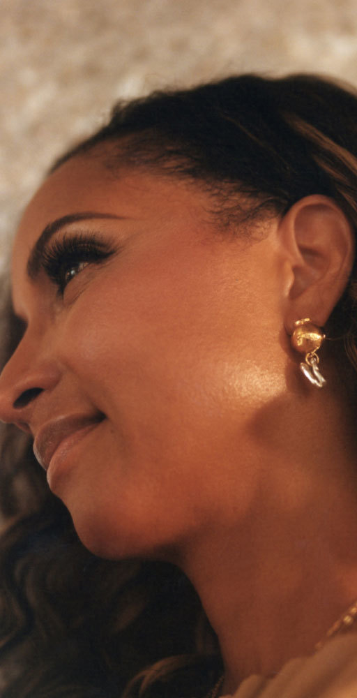 Shirley Madere side profile with earrings